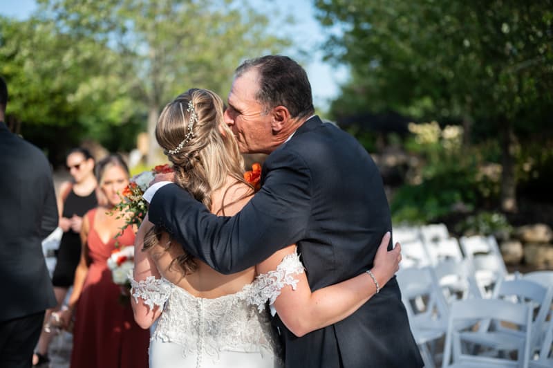 Hug at Deerfield Country Club in Hilton, NY | Western New York Wedding Photography